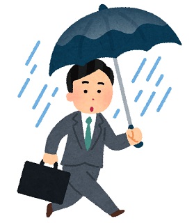 傘をさす男性