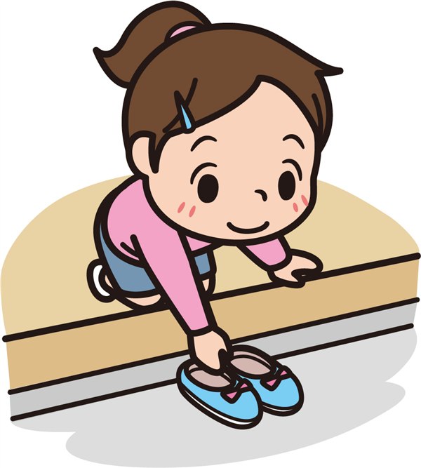 玄関で靴を揃える女の子